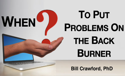 When to Put Problems on the Back Burner